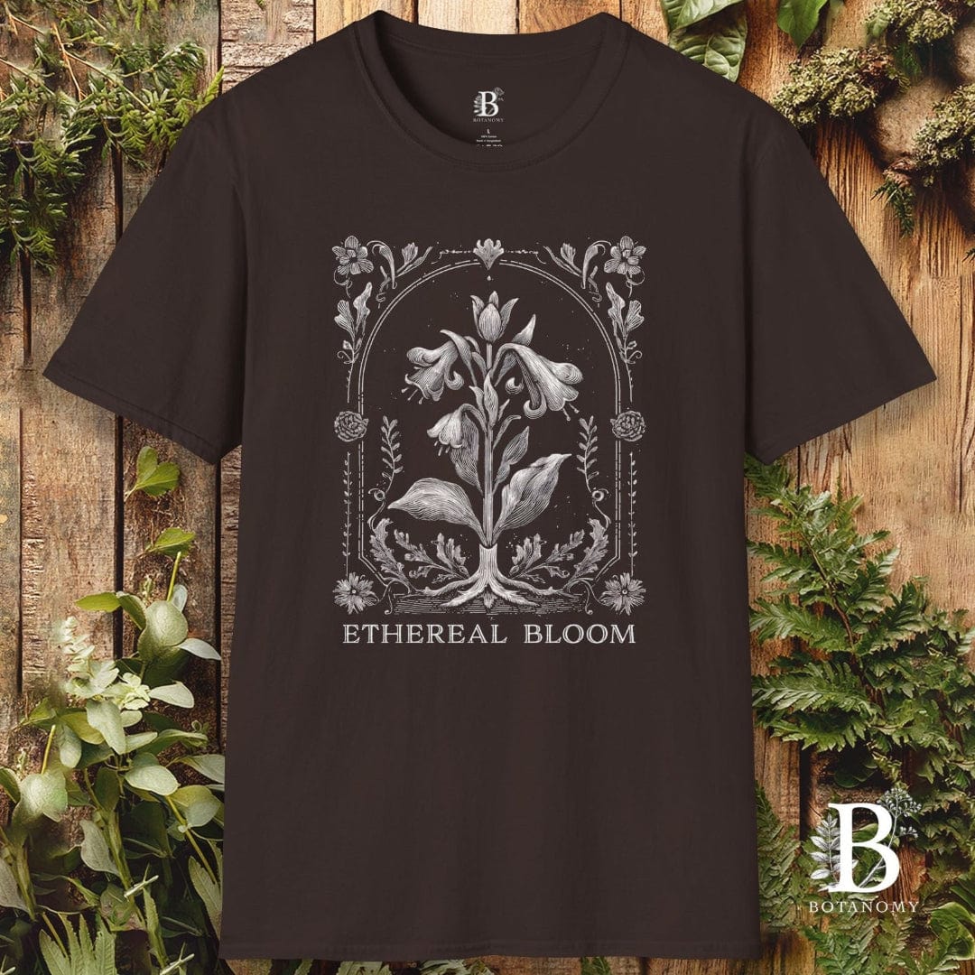 Black t-shirt with floral design and 'Ethereal Bloom' text on a wooden background