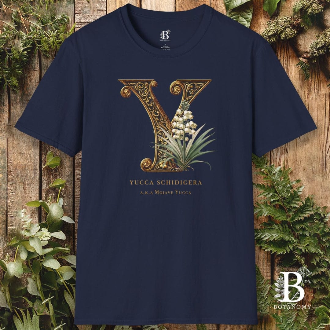 Navy blue t-shirt with decorative letter 'Y' design on a wooden background