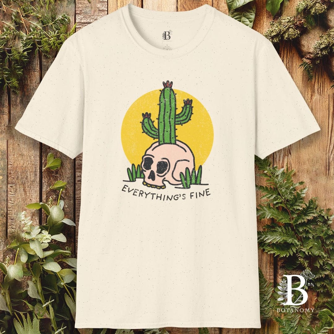 Beige t-shirt with a cactus and skull design on a wooden background