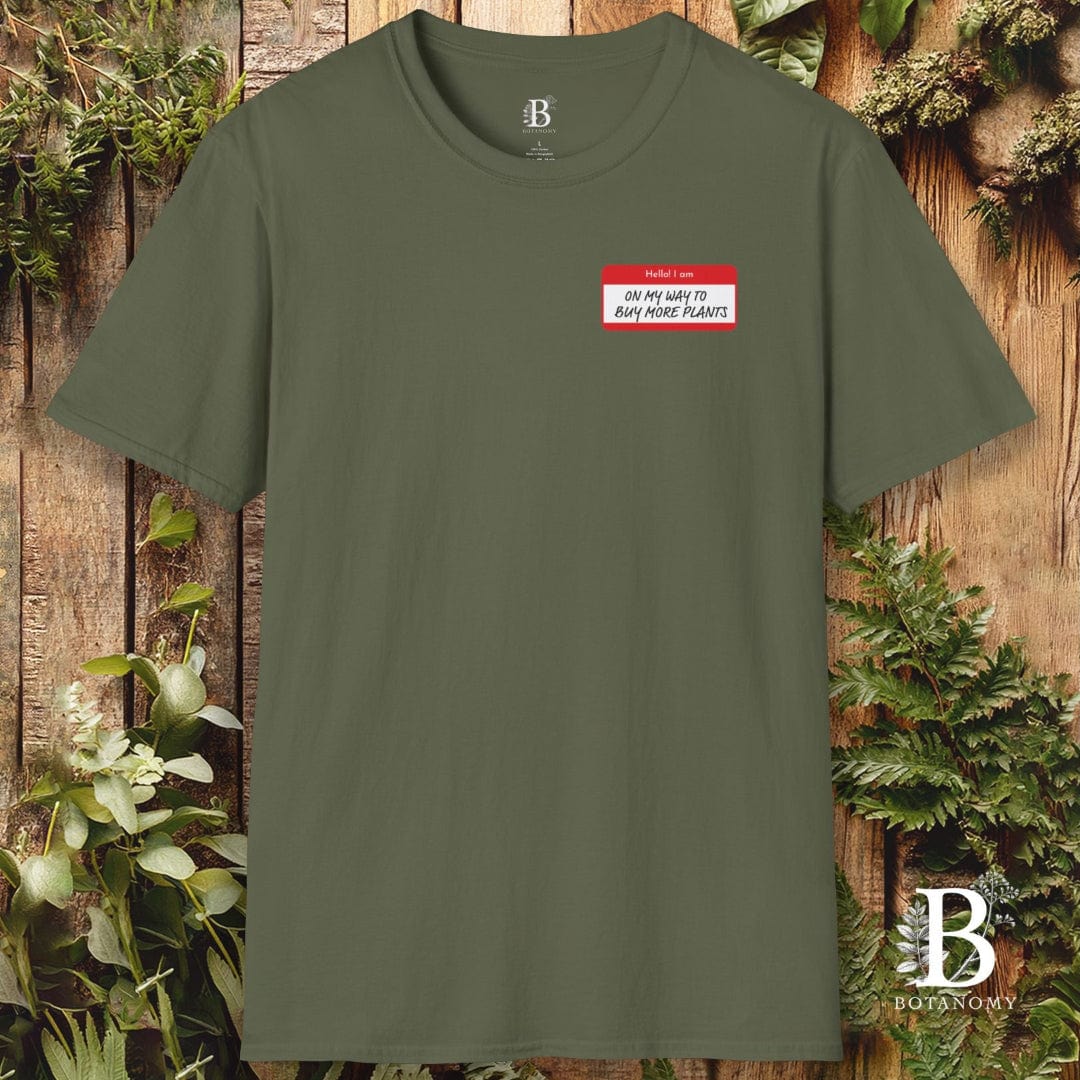 Green t-shirt with a name tag design on a wooden background