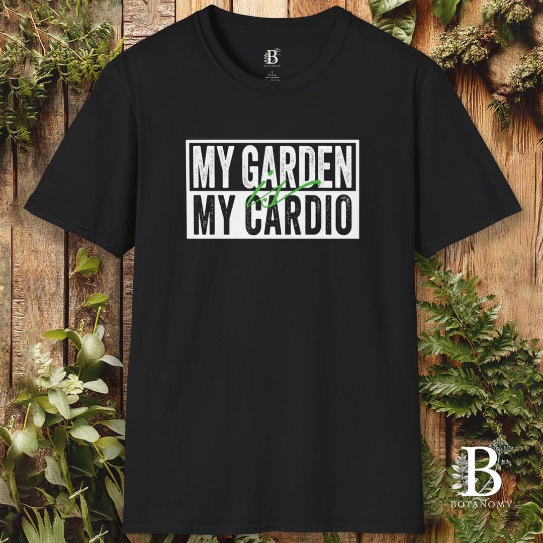 Black t-shirt with 'My Garden My Cardio' text on a wooden background with plants