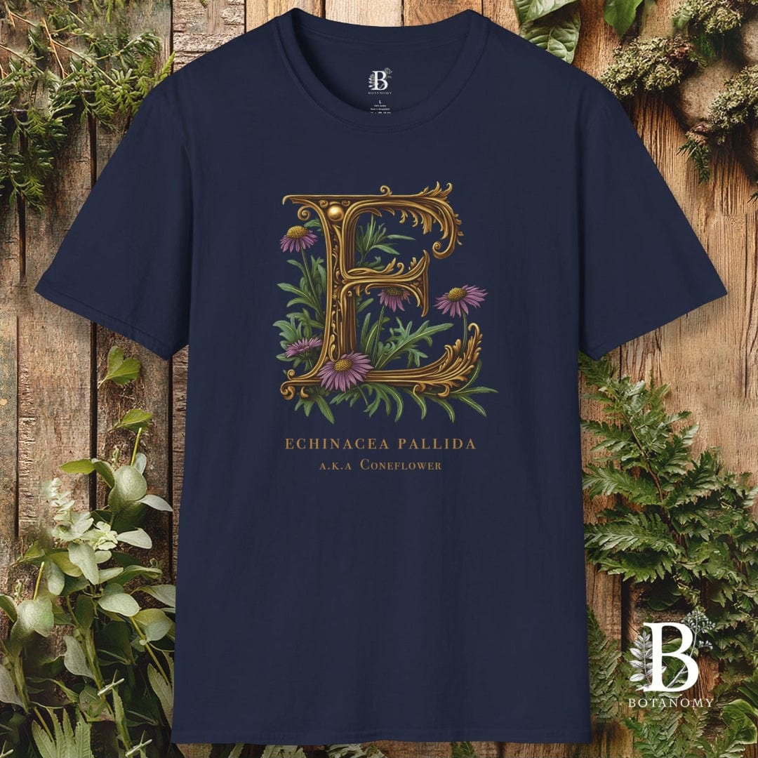 Navy blue t-shirt with decorative letter 'E' design on a wooden background