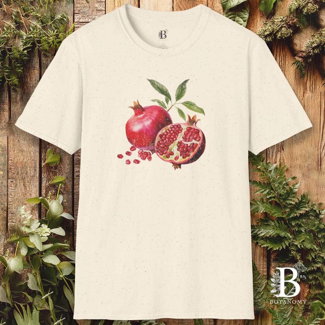 Beige t-shirt with pomegranate design on a wooden background