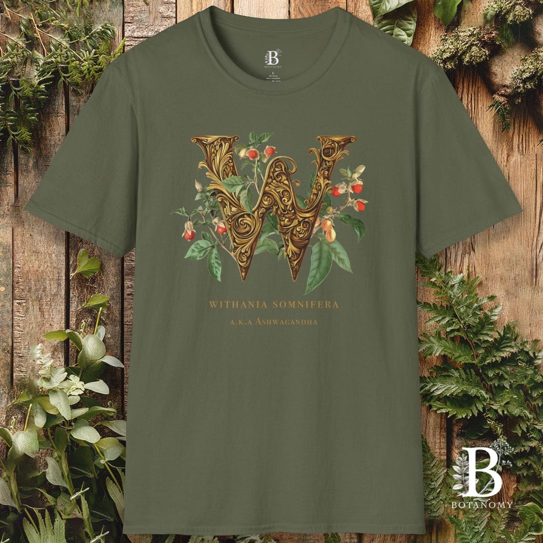 Green t-shirt with decorative letter 'W' design on a wooden background