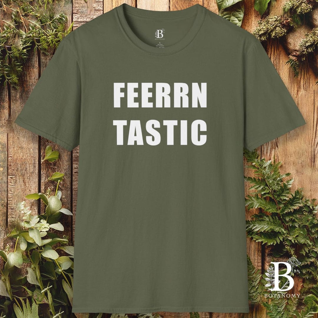 Green t-shirt with 'FEERRN TASTIC' text on a wooden background