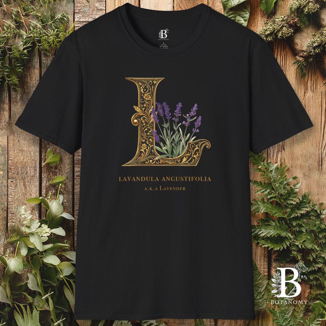 Black t-shirt with lavender design and brand logo on a wooden background