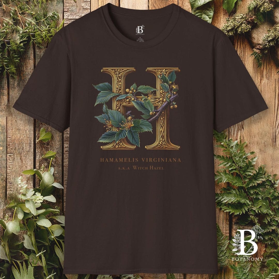 Black t-shirt with floral design and 'B' logo on a wooden background