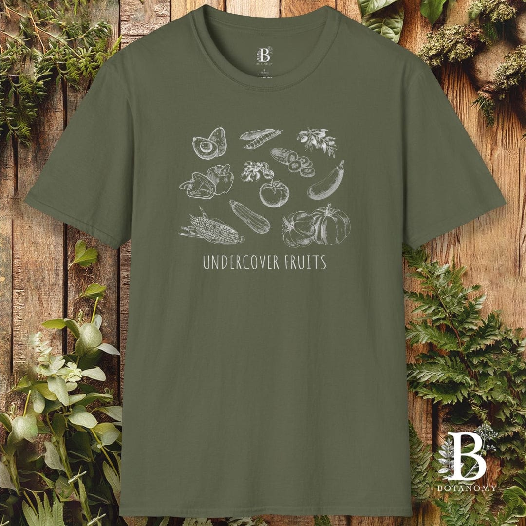 Green t-shirt with white graphic design and text on a wooden background