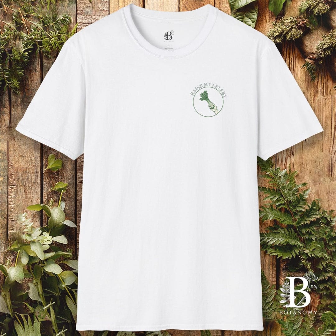 White t-shirt with a logo on a wooden background with plants