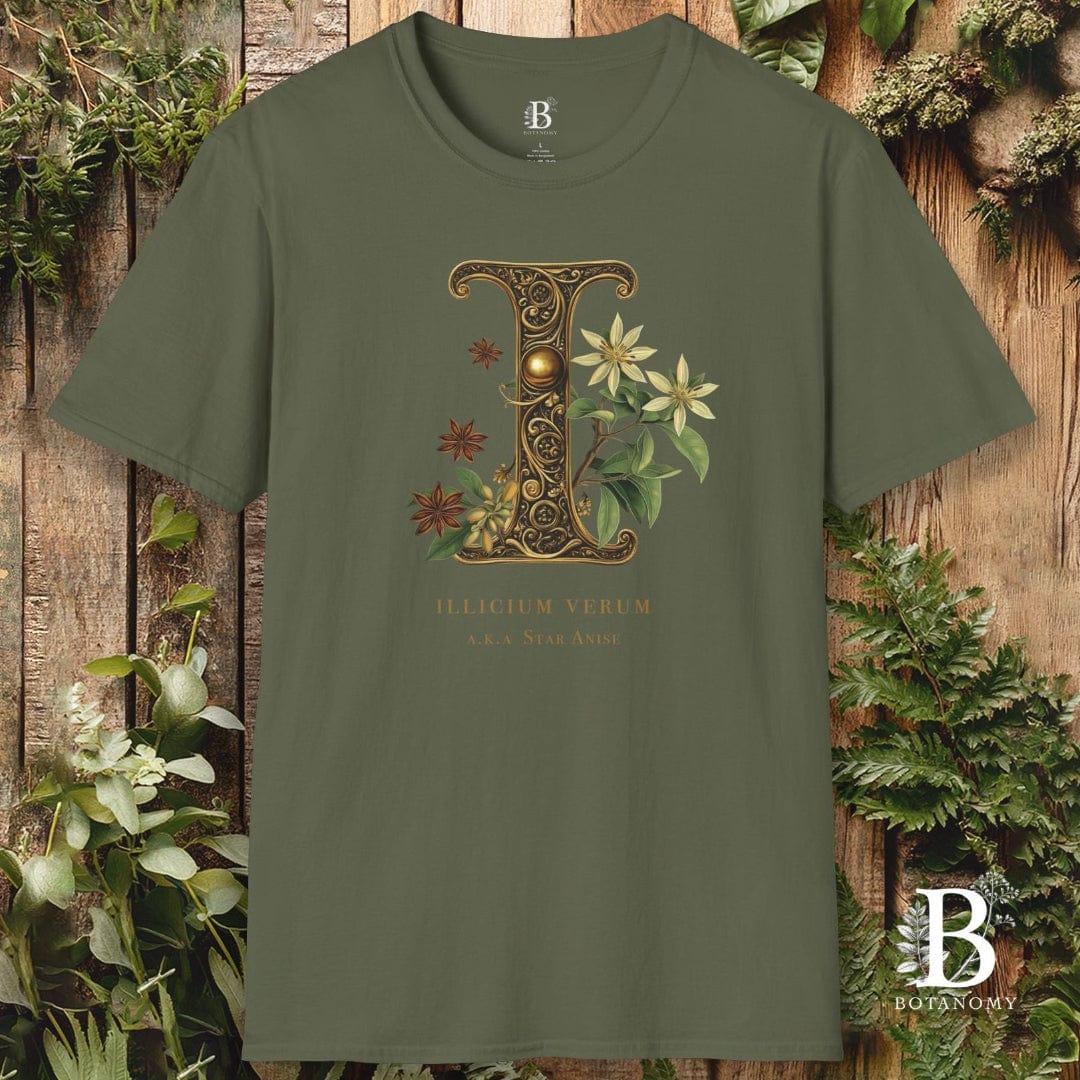Green t-shirt with decorative letter 'L' design on a wooden background