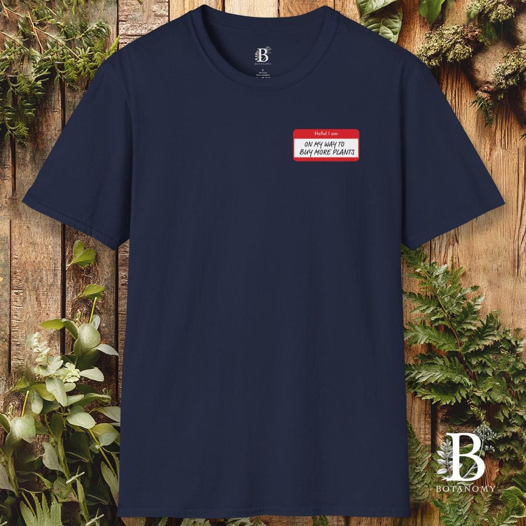 Navy blue t-shirt with a red and white label design on a wooden background