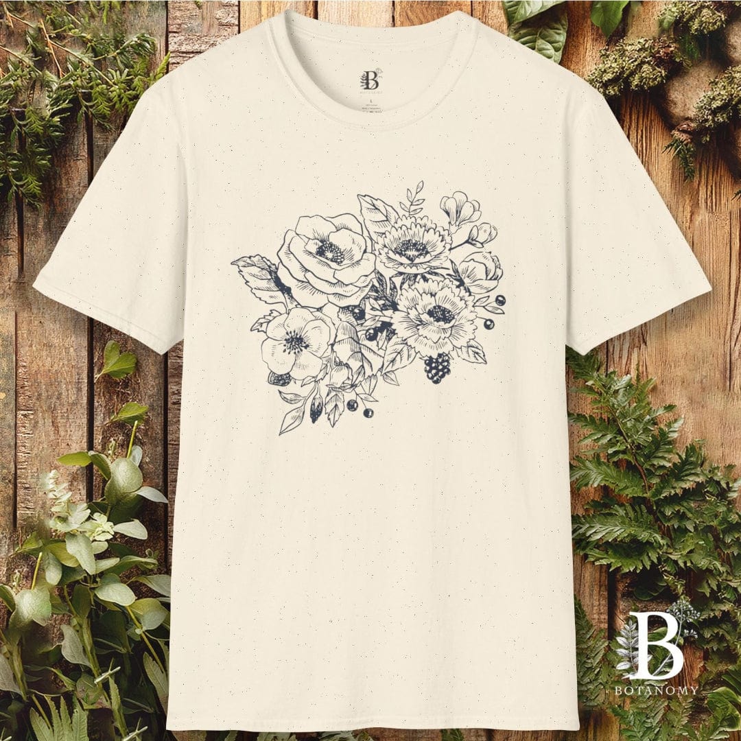 Beige t-shirt with floral design on a wooden background