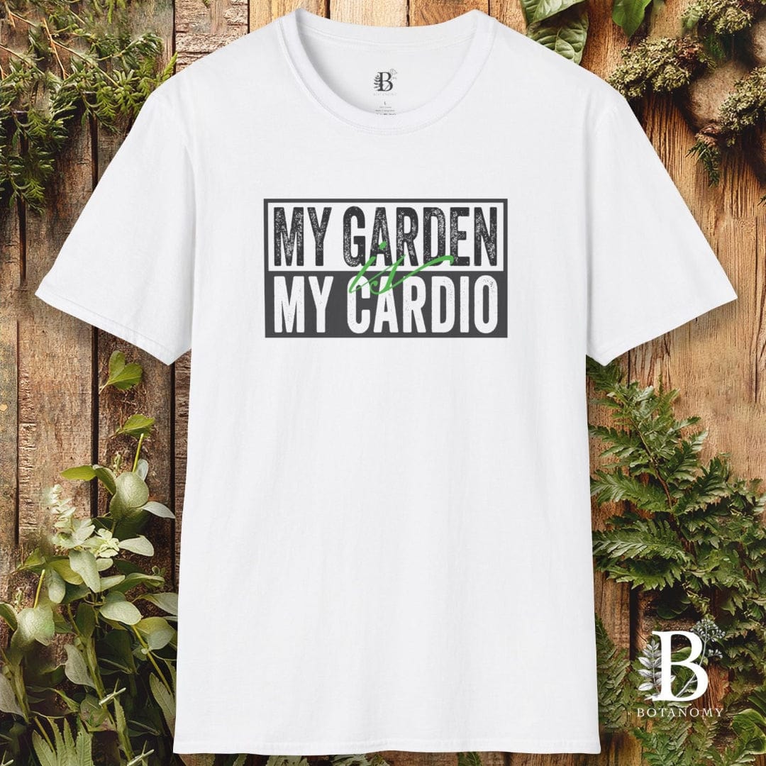 White t-shirt with 'My Garden My Cardio' text on a wooden background with plants