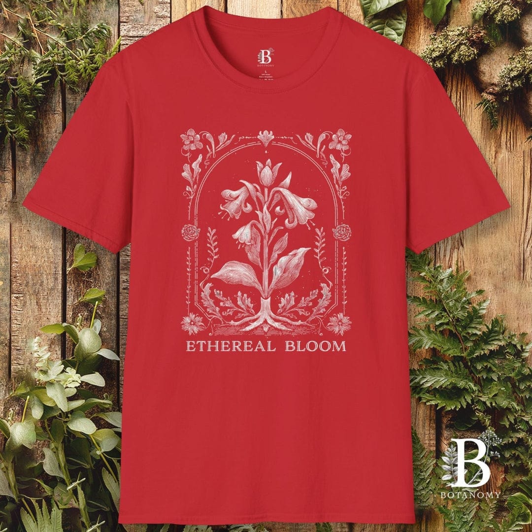 Red t-shirt with floral design and 'Ethereal Bloom' text on a wooden background