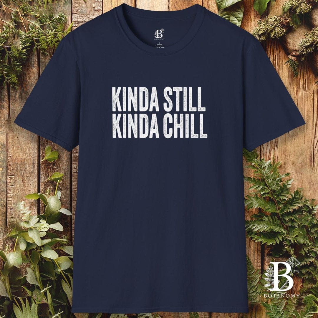 Navy blue t-shirt with 'KINDA STILL KINDA CHILL' text on a wooden background
