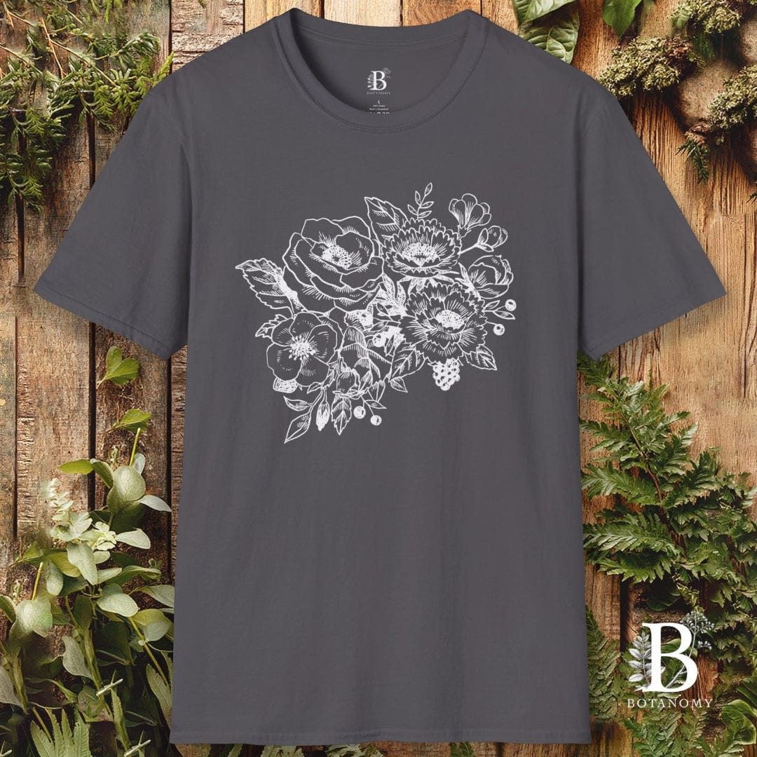 Dark gray t-shirt with floral design on a wooden background