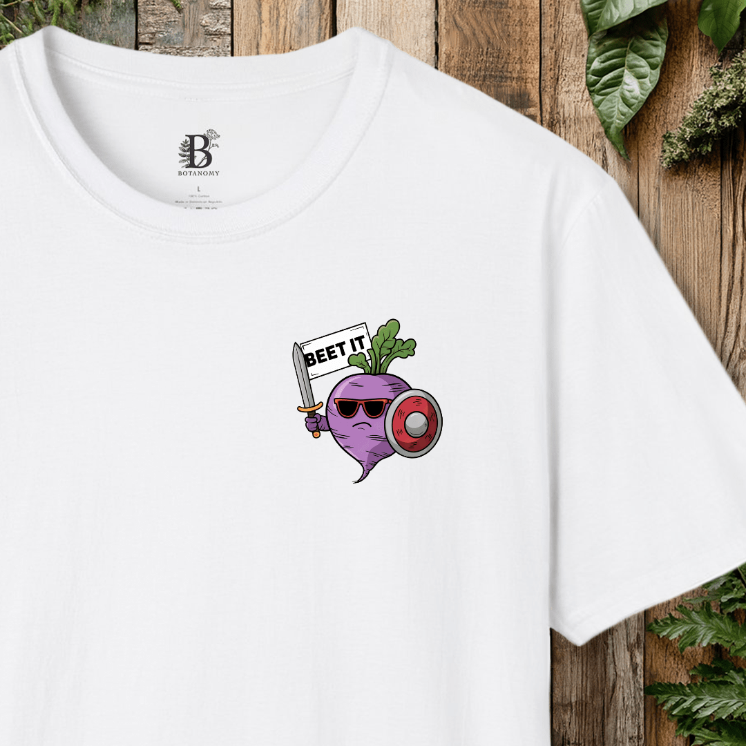 White t-shirt with a graphic design of a beet holding a sword and shield on a wooden background.