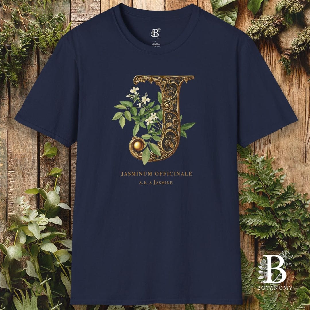 Navy blue t-shirt with decorative letter 'J' design on a wooden background