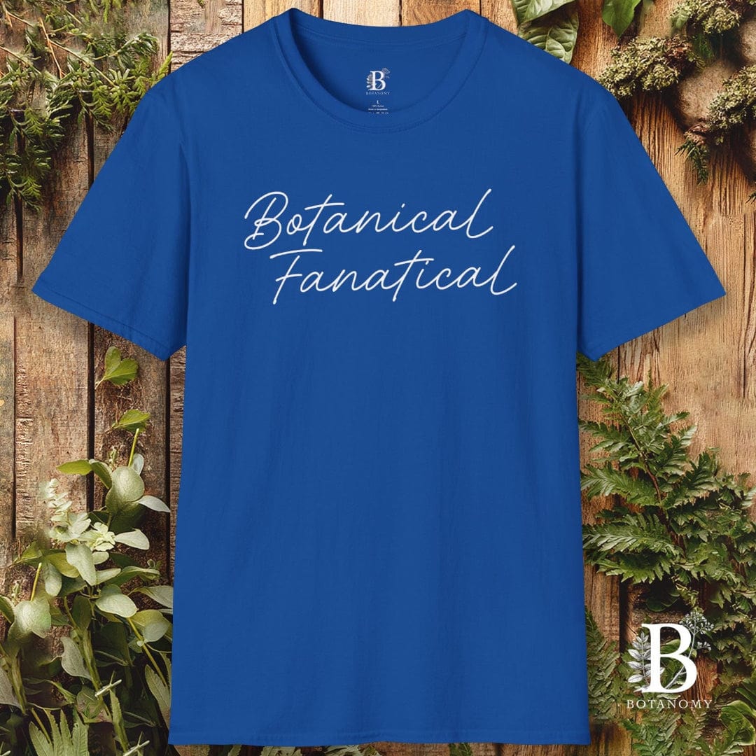 Blue t-shirt with 'Botanical Fanatical' text on a wooden background with plants