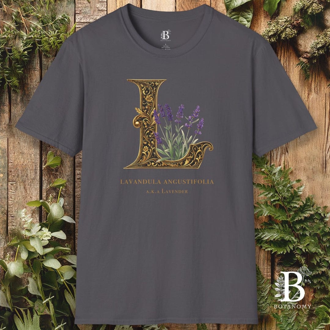 Gray t-shirt with decorative letter 'L' and lavender design on a wooden background