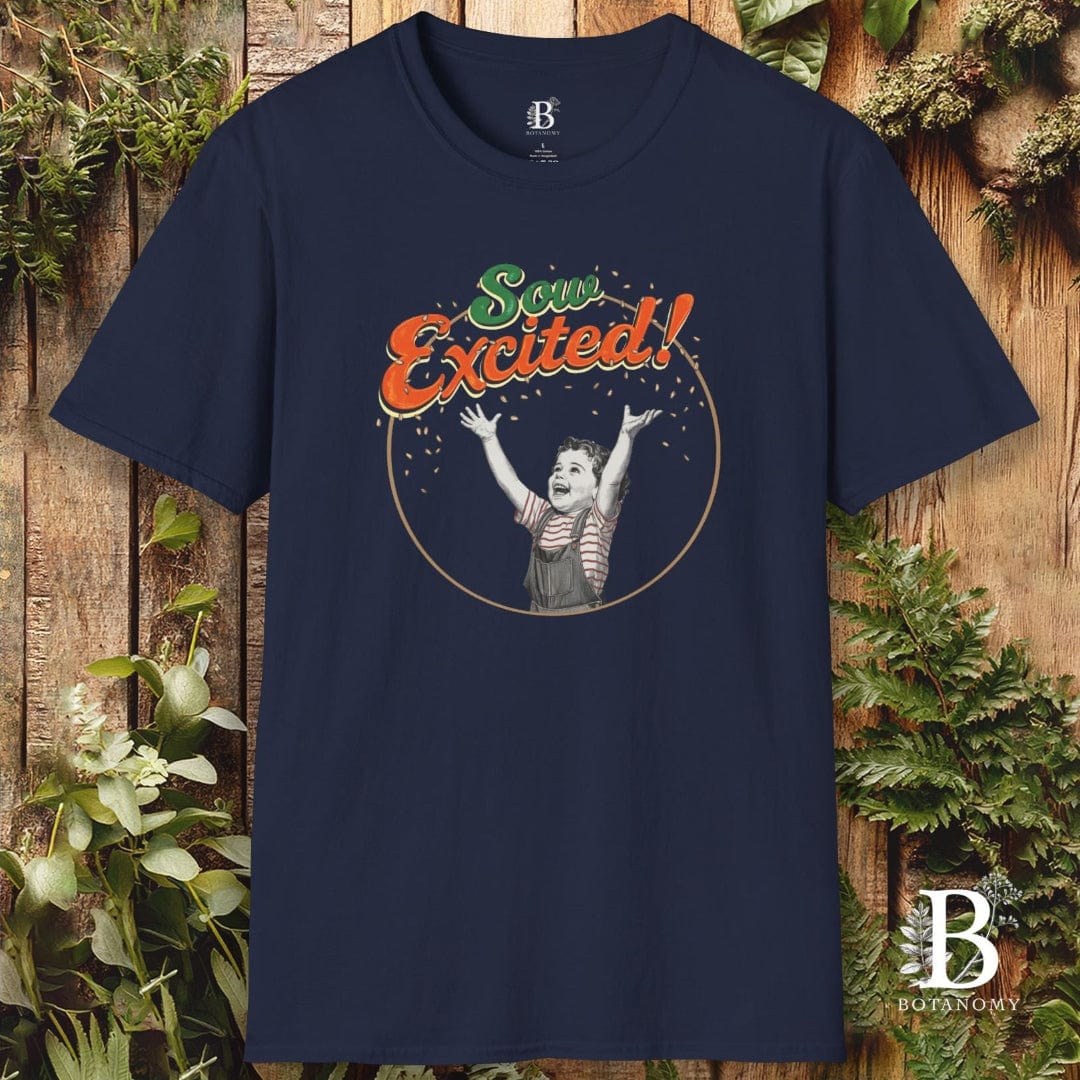 Navy blue t-shirt with 'So Excited!' graphic design on a wooden background