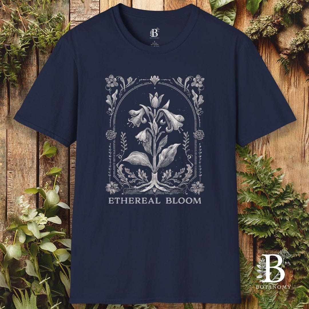 Navy blue t-shirt with floral design and 'Ethereal Bloom' text on a wooden background