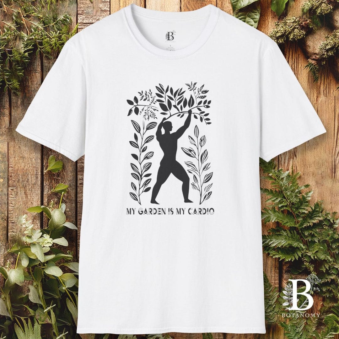 White t-shirt with black graphic design on a wooden background with plants