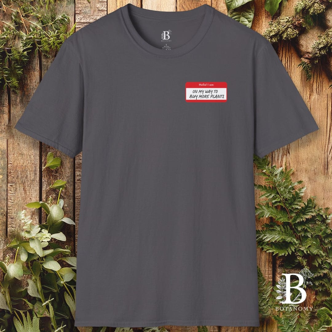 Gray t-shirt with a red name tag graphic on a wooden background