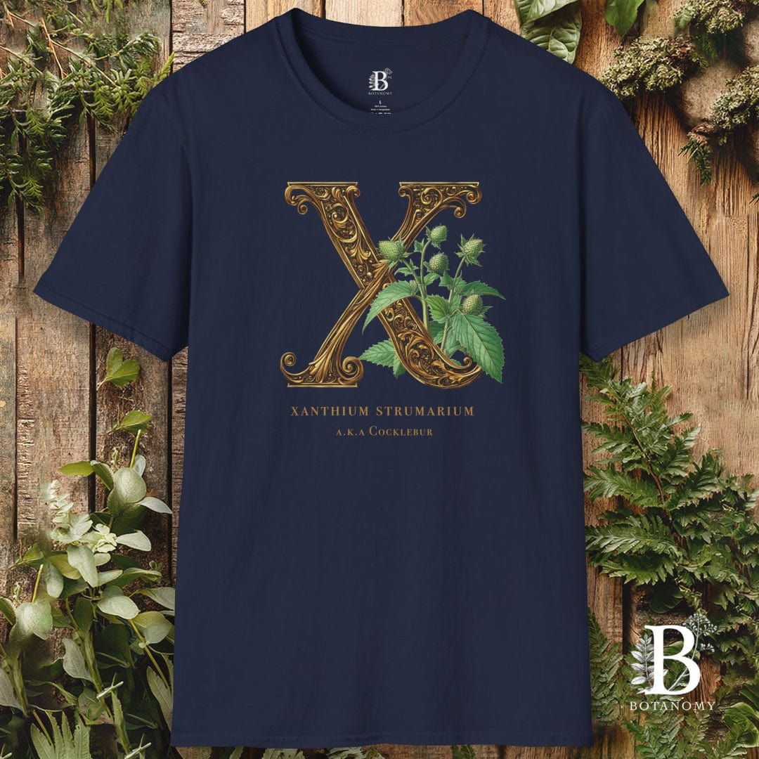 Navy blue t-shirt with decorative letter 'X' design on a wooden background