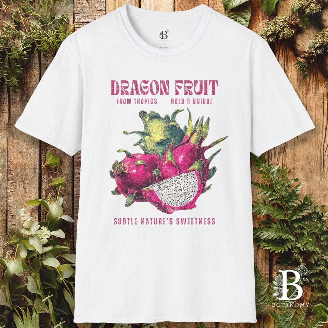 White t-shirt with dragon fruit graphic and text on a wooden background