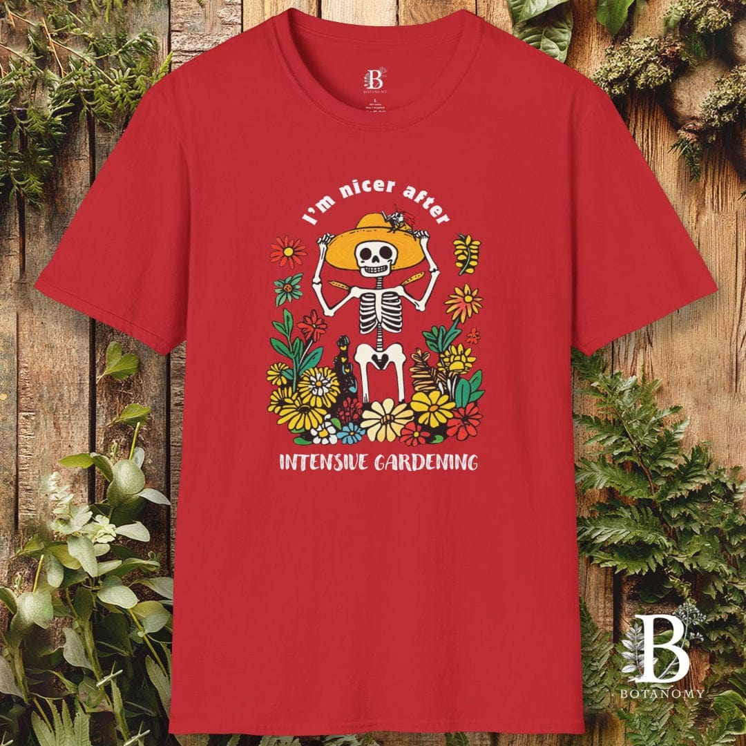 Red t-shirt with skeleton and floral design on a wooden background