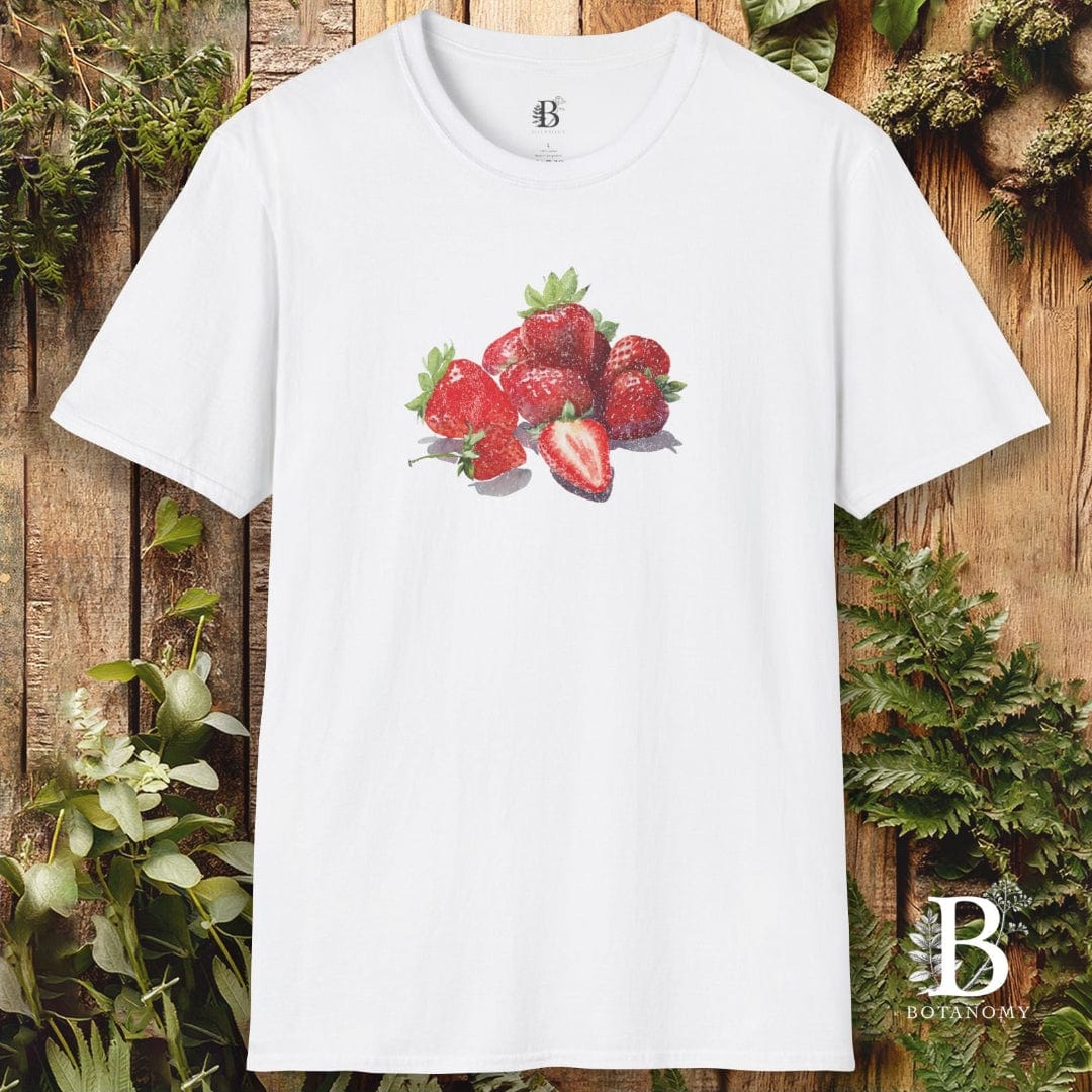 White t-shirt with strawberry design on a wooden background