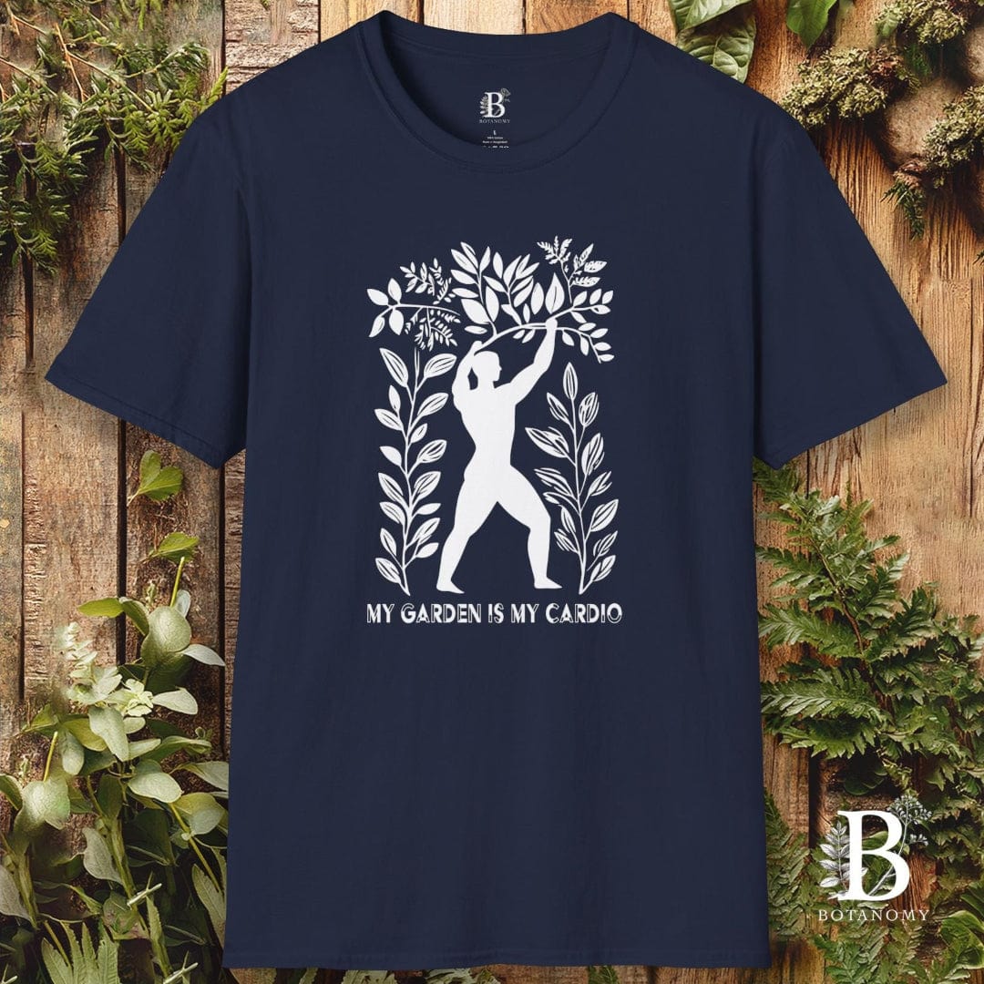 Navy blue t-shirt with white graphic design and text on a wooden background with plants.