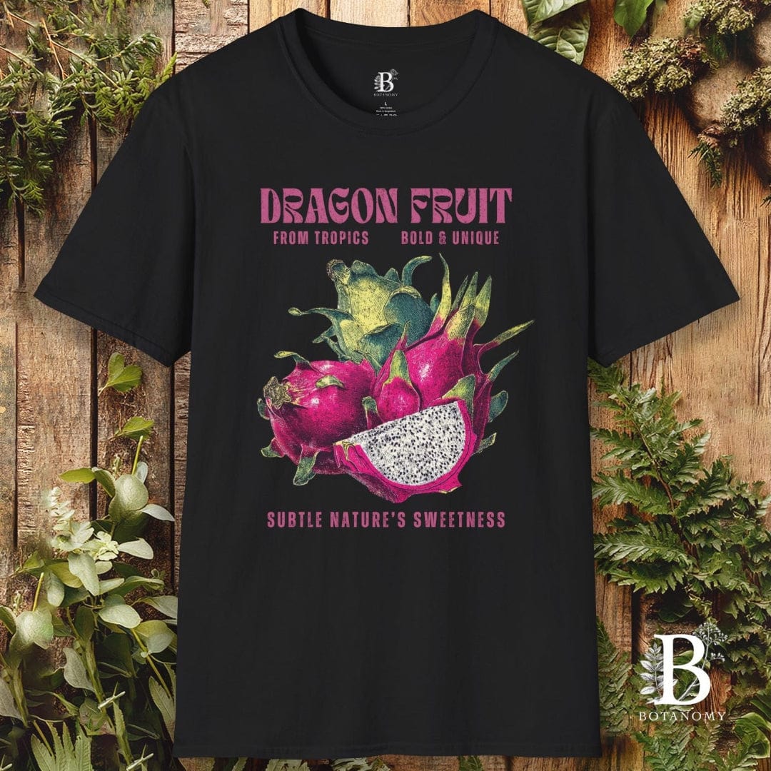 Black t-shirt with dragon fruit graphic and text on a wooden background