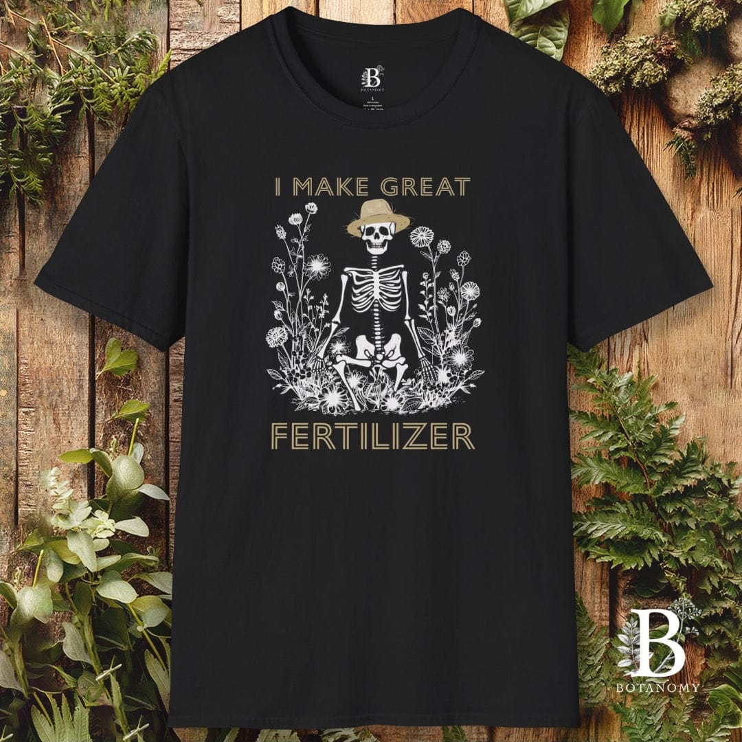 Black t-shirt with skeleton design and text on a wooden background