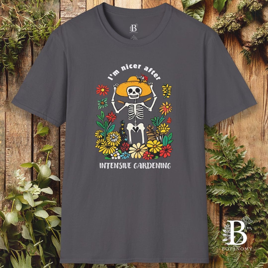 Gray t-shirt with skeleton and floral design on a wooden background