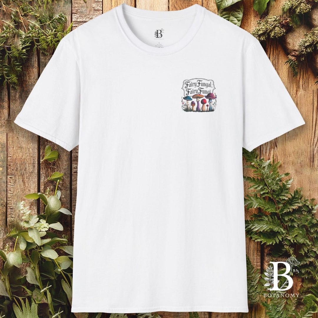 White t-shirt with a logo on a wooden background with plants