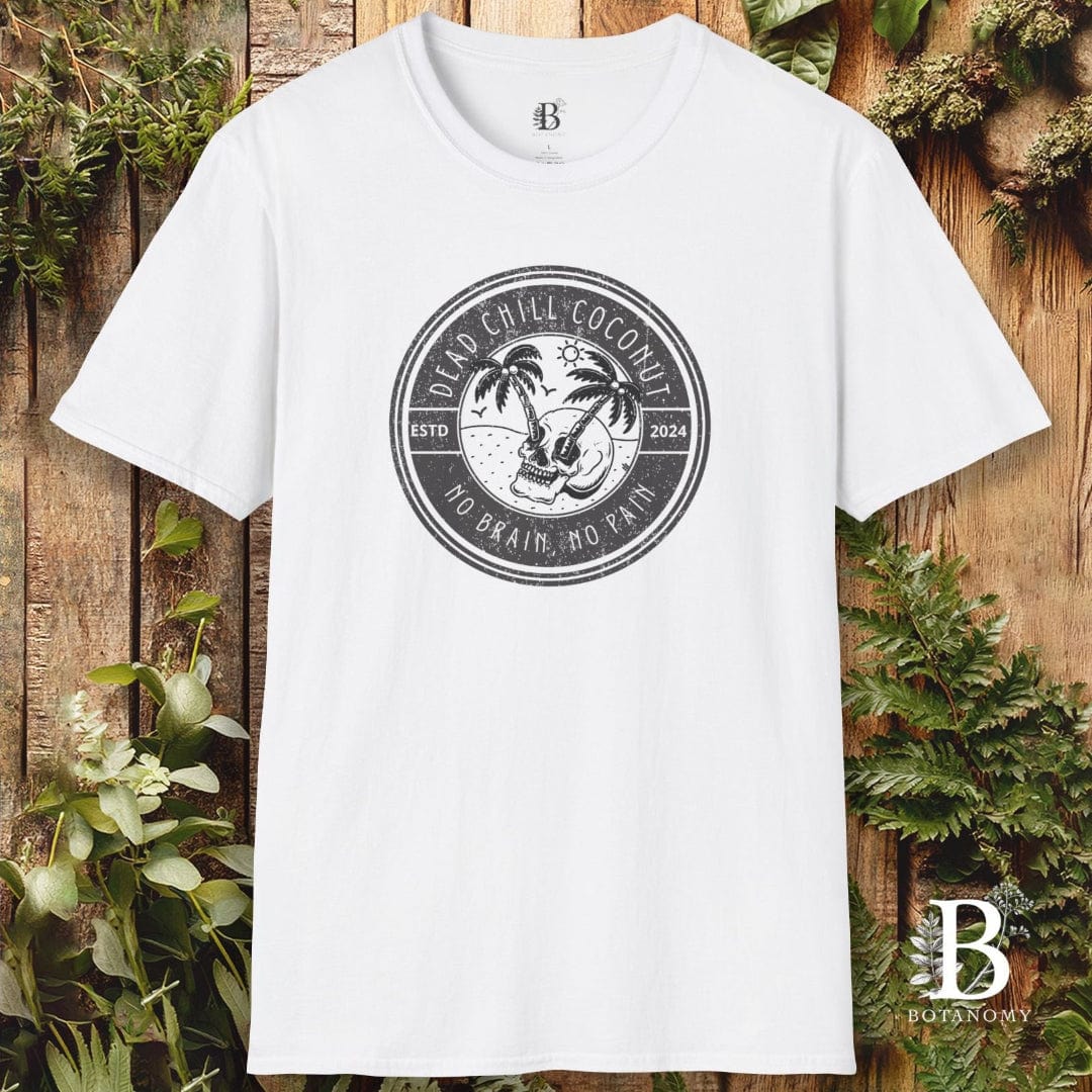 White t-shirt with a black logo on a wooden background with plants