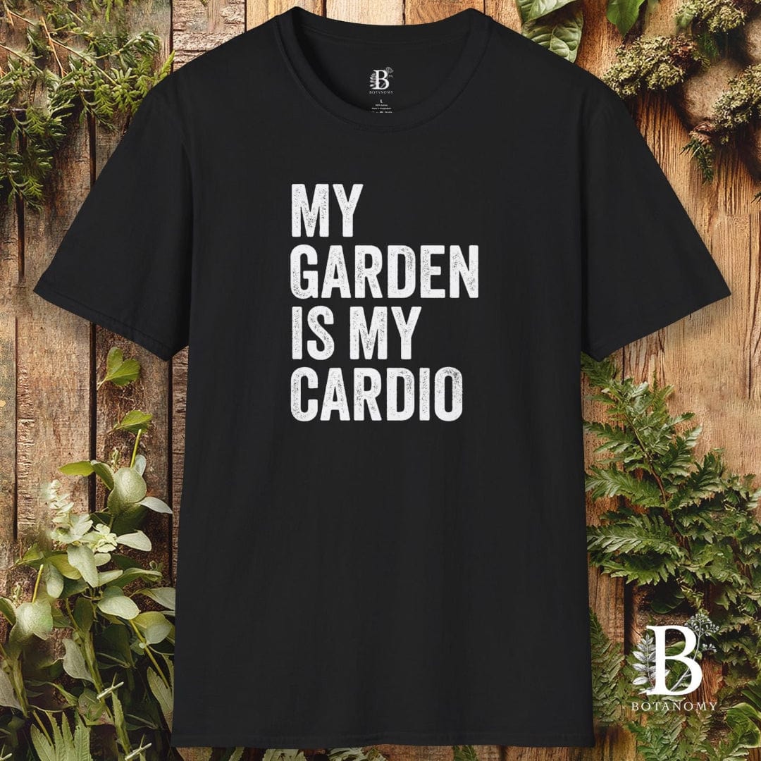 Black t-shirt with 'My Garden is My Cardio' text on a wooden background with plants.