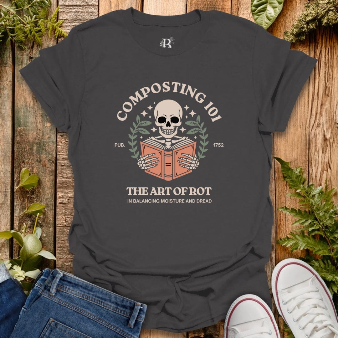 Black t-shirt with composting graphic on a wooden background with plants