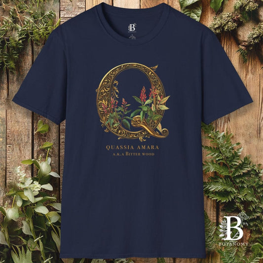 Navy blue t-shirt with decorative 'Q' design on a wooden background