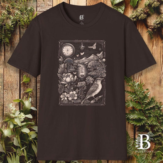 Black t-shirt with nature-themed design on a wooden background