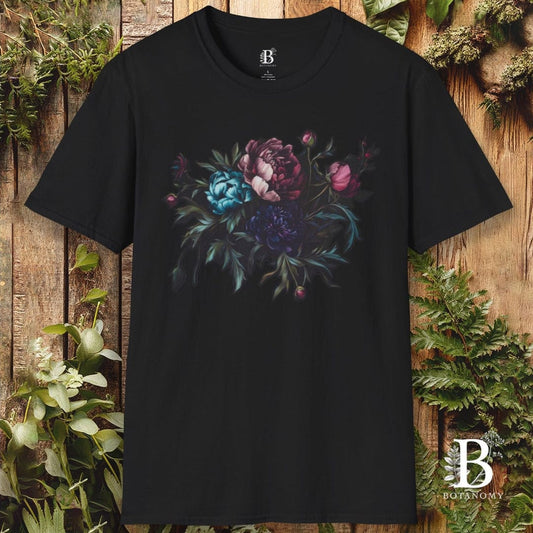 Black t-shirt with floral design on a wooden background