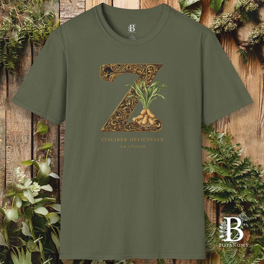 Green t-shirt with decorative letter 'Z' design on a wooden background