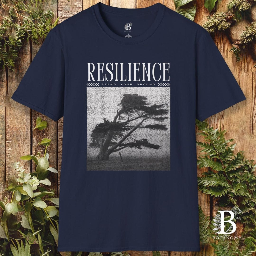 Navy blue t-shirt with 'RESILIENCE' graphic and tree design on a wooden background
