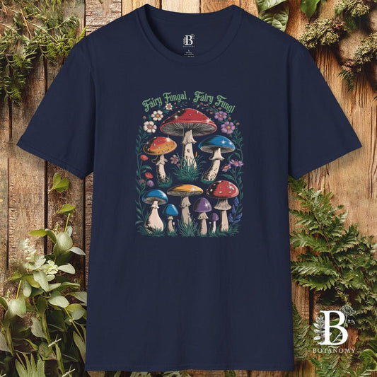 Navy blue t-shirt with colorful mushroom design on a wooden background
