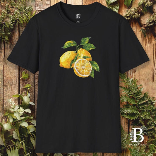 Black t-shirt with lemon design on a wooden background