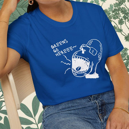 Person wearing a blue t-shirt with a graphic design sitting on a chair.