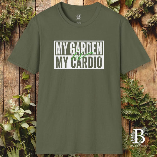 Green t-shirt with 'My Garden My Cardio' text on a wooden background with plants.
