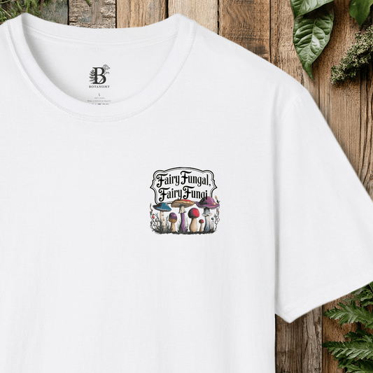 White t-shirt with 'Fairy Fungal' design on a wooden background